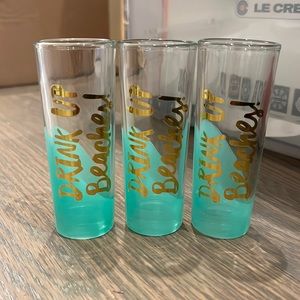 “Drink up beaches” shot glasses